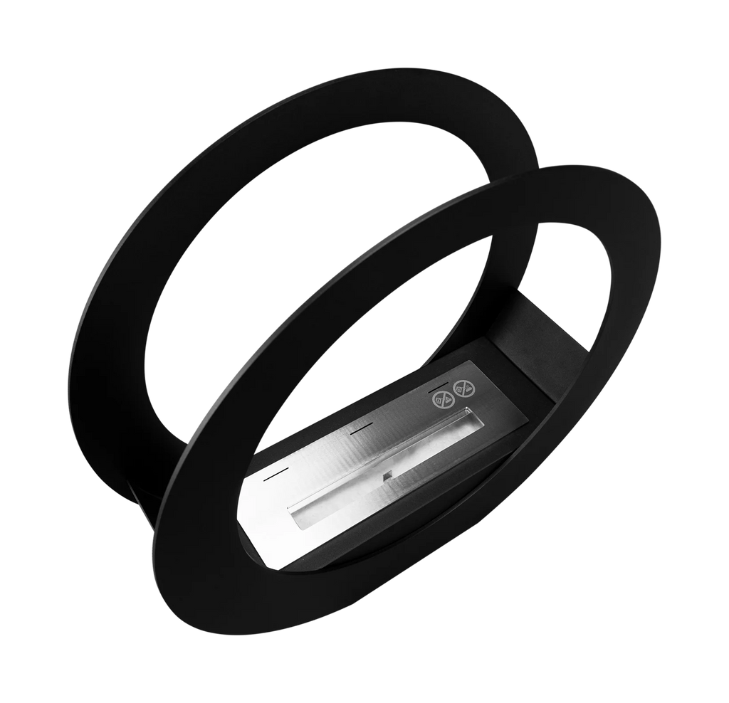 Elevated angled view of the ONLY black bioethanol fireplace showing the burner between its two circular frames