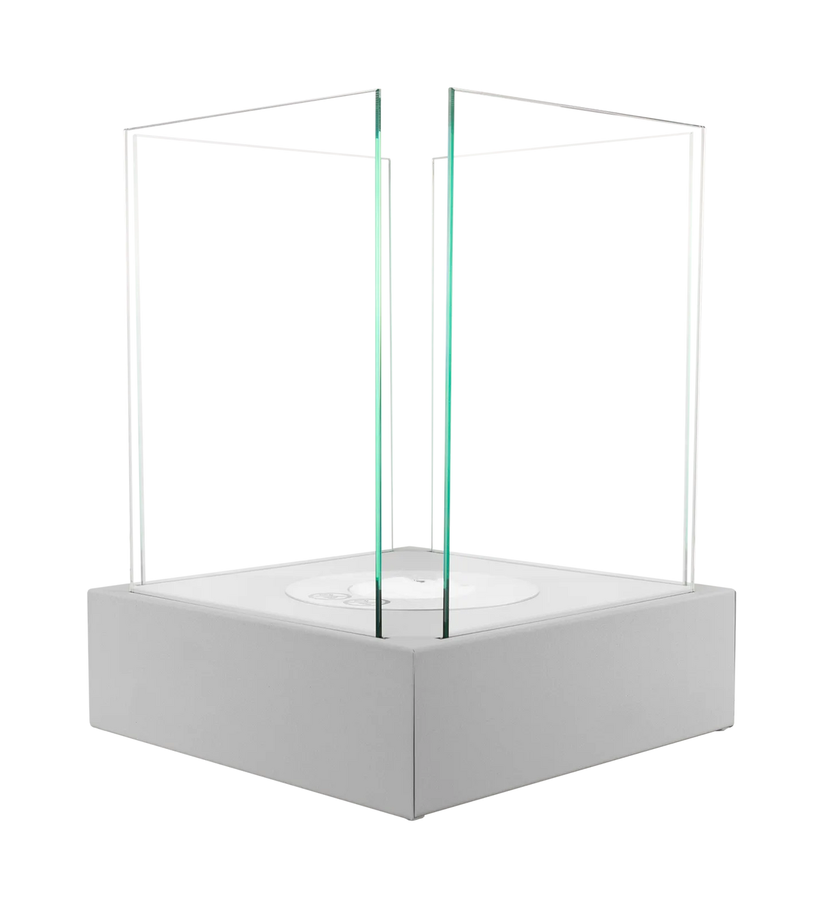 Angled view of the Sunset Garden Mini matt grey fireplace with four clear glass panels